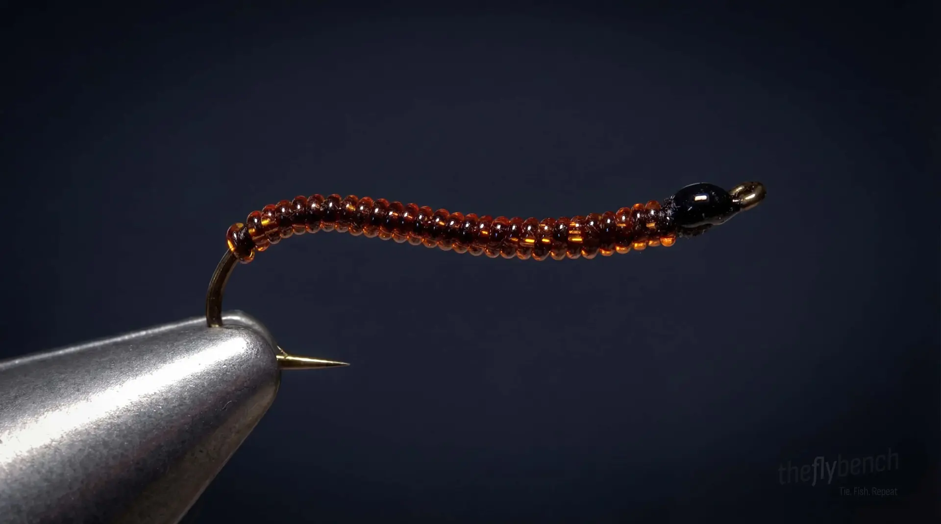 Ken's Crystal Worm fly pattern - imitates Worms tied for Trout