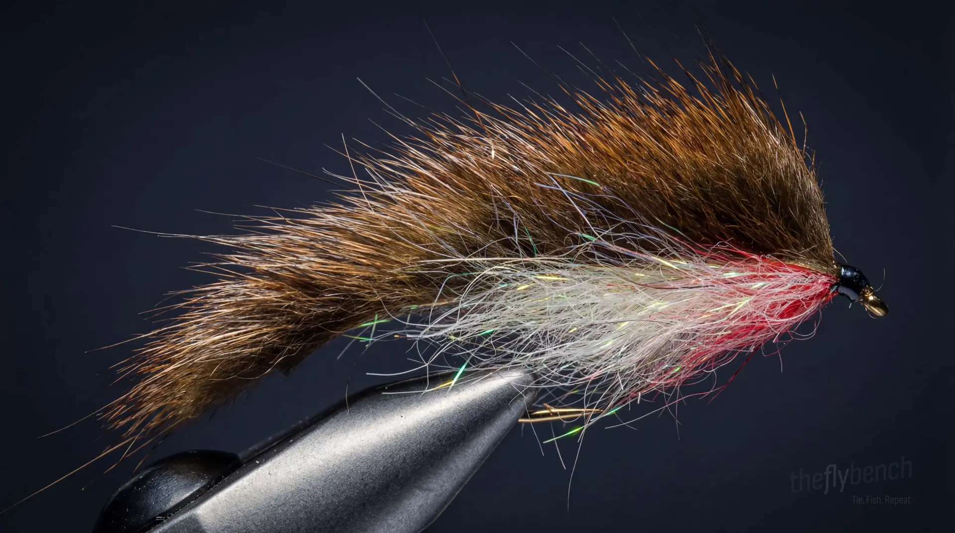 Composite Loop Zonker fly pattern - imitates Baitfish tied for Trout, Bass