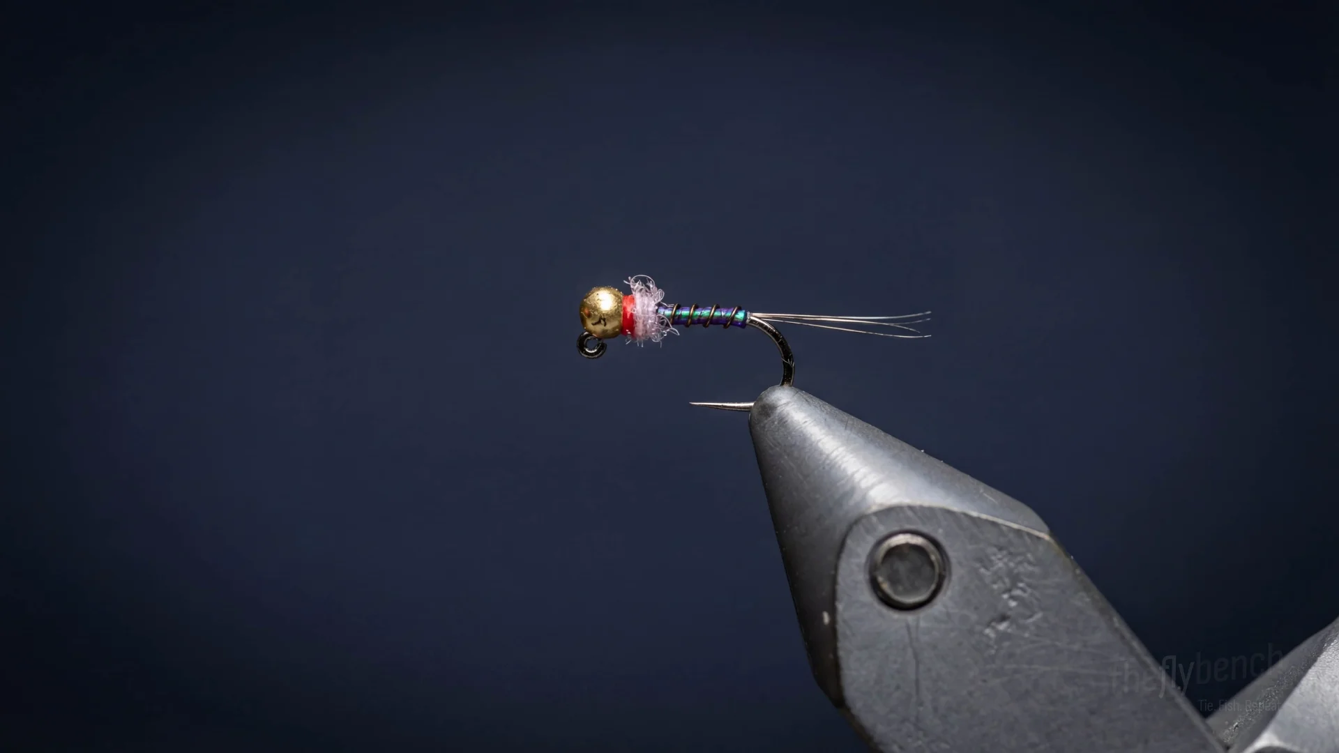 The Holographic Frenchie fly pattern - imitates Mayfly Nymphs tied for Trout
